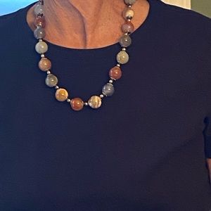 Semi-precious stone necklace with brass color gold.